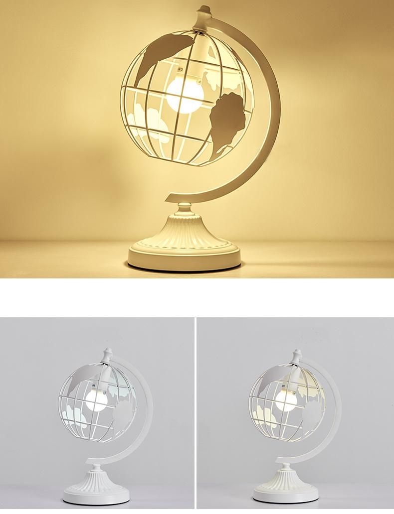 Modern Nodic Selling White Color Iron Metal Sculpture Hollow out Rotation Decorative World Globe Table LED Light Lighting Lamp