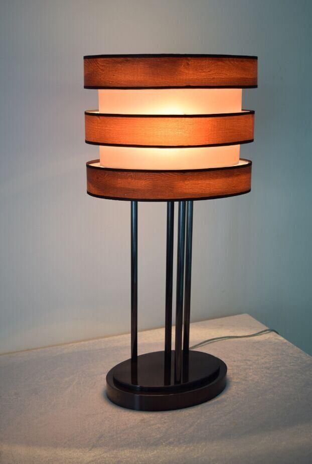 White Fabric Lamp Shade with Wood and Black Metal Lamp Body Table Lamp.
