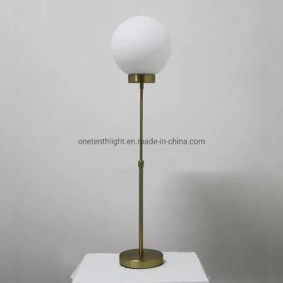 Metal Body in Brushed Brass Finish and Opal Glass Shade Table Lamp