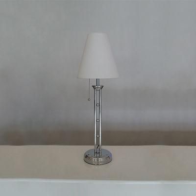 Metal Lamp Body in Stain Nickel Finish and off Yellow Fabric Shade Table Lamp.