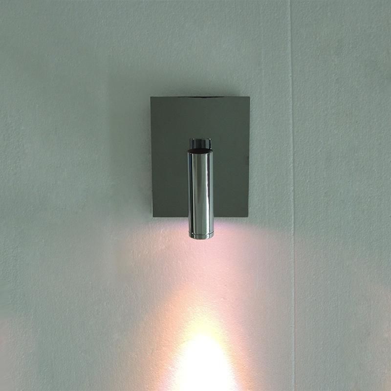 Brushed Nickel Lamp Shade and Metal Wall Plate Wall Lamp.