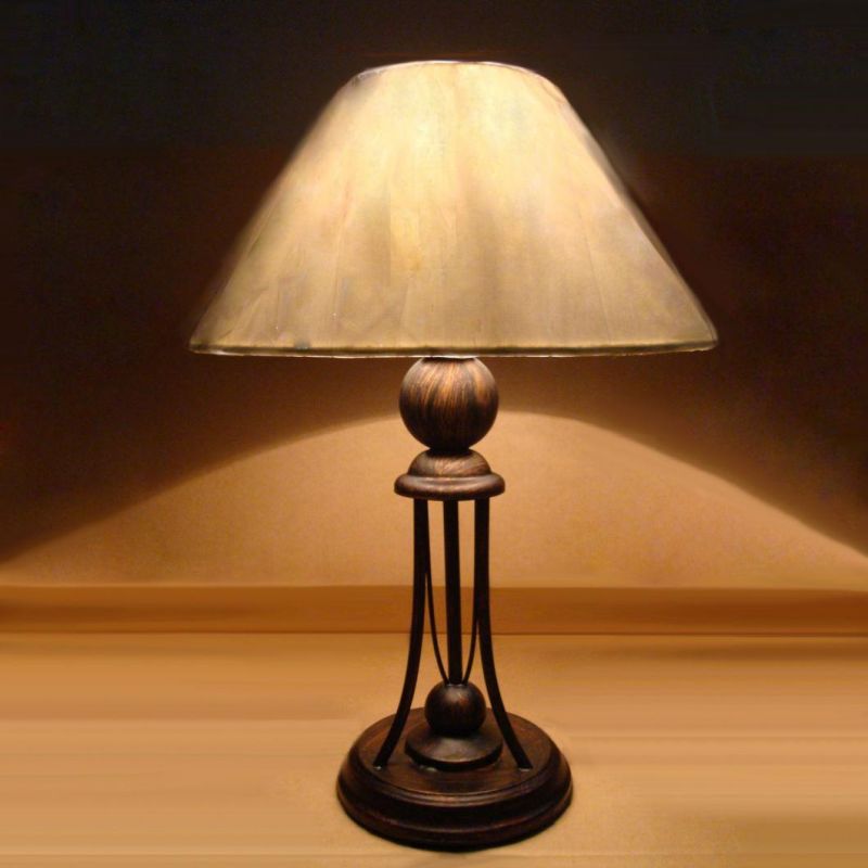 Metal Body and off White Fabric Shade Table Lamp.