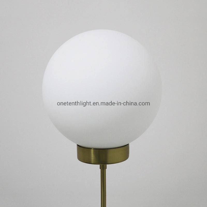 Metal Body in Brushed Brass Finish and Opal Glass Shade Table Lamp
