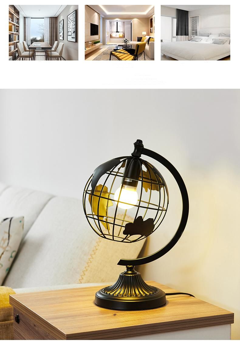 Hot Selling Black Color Iron Metal Sculpture Hollow out Rotation Decorative World Globe LED Table Lamp