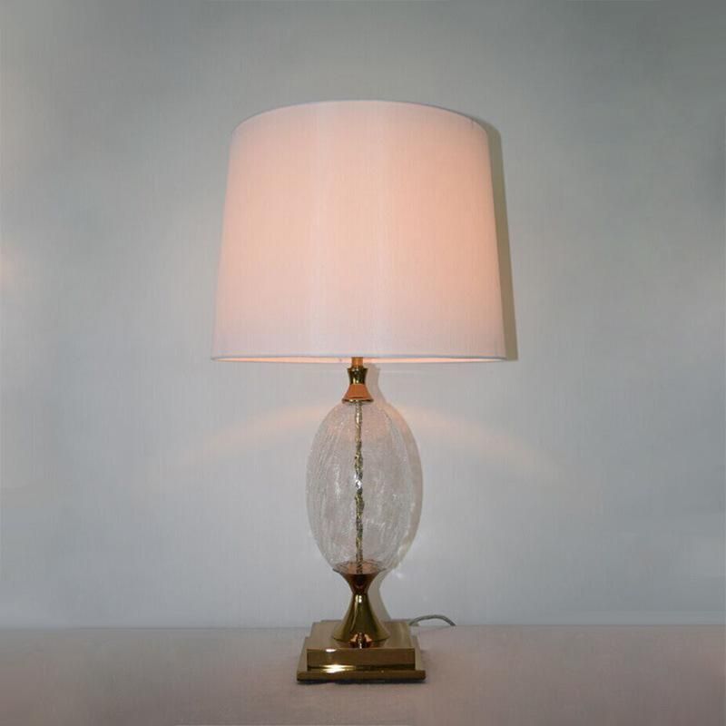 Clear Glass Lamp Body and Lamp Base in Brass Finish Table Lamp.