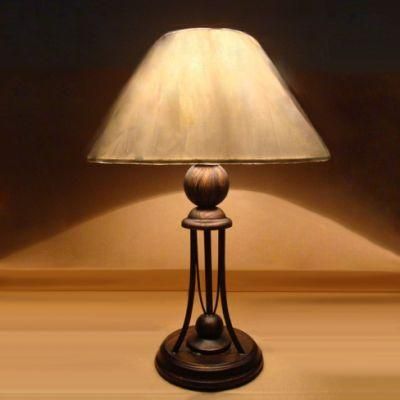 Metal Body and off White Fabric Shade Table Lamp.