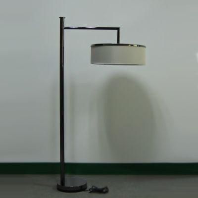 White Silk Fabric Lamp Shade and Polished Black Lamp Body Floor Lamp.