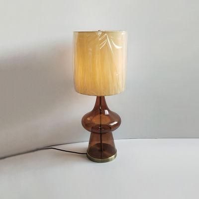 Acrylic Fabric Shade and Brown Glass Body Table Lamp.