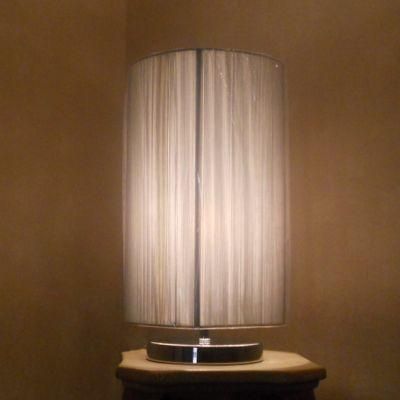 Silver String Fabric Shade and Round Metal Base Table Lamp.