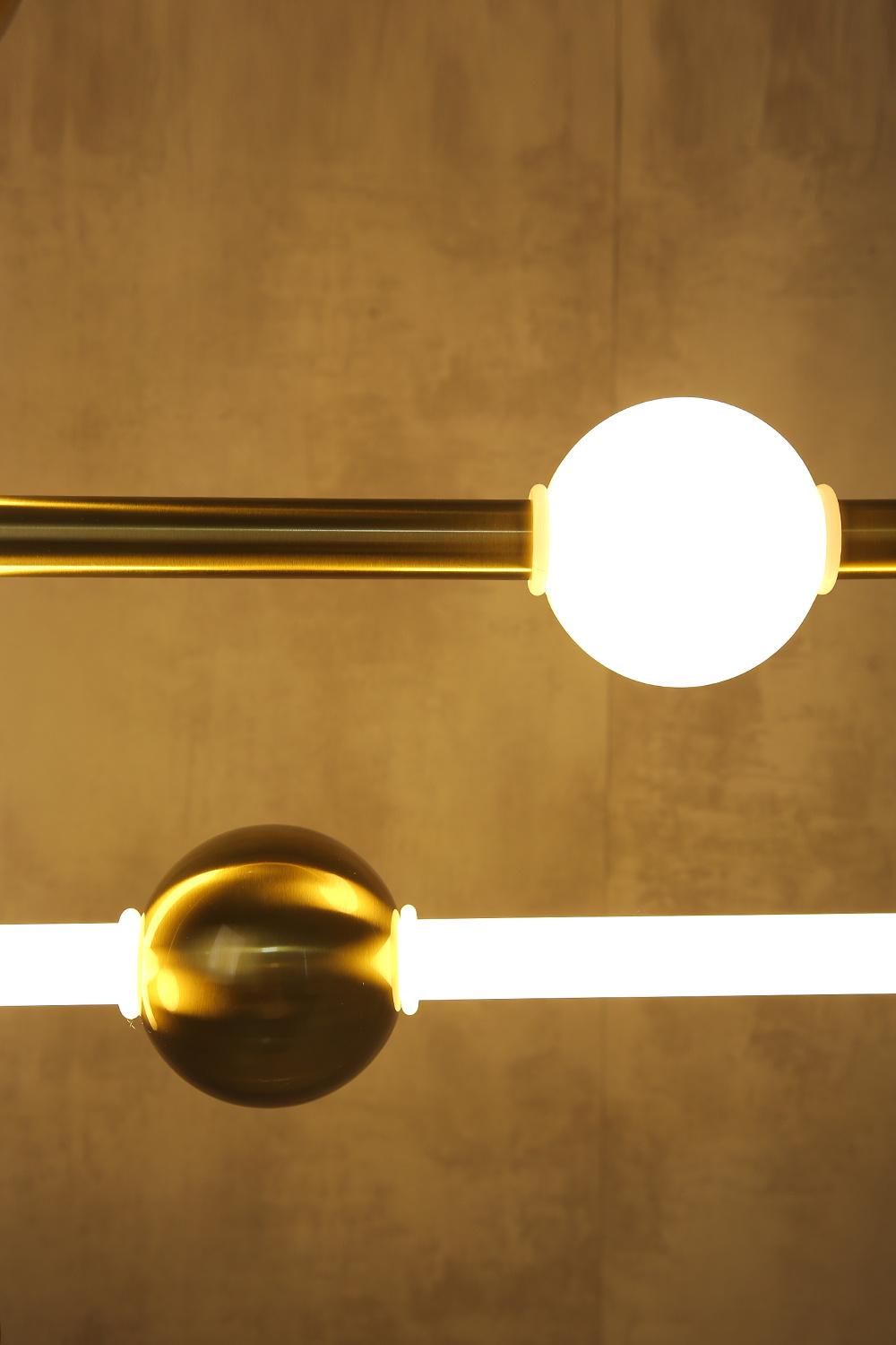 Horizontal and Vertical Metal Luminous Ball Line Chandelier