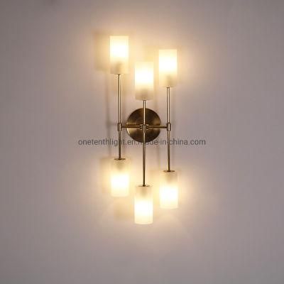 Metal in Brass Finish and Frosted Glass Shade Wall Lamp
