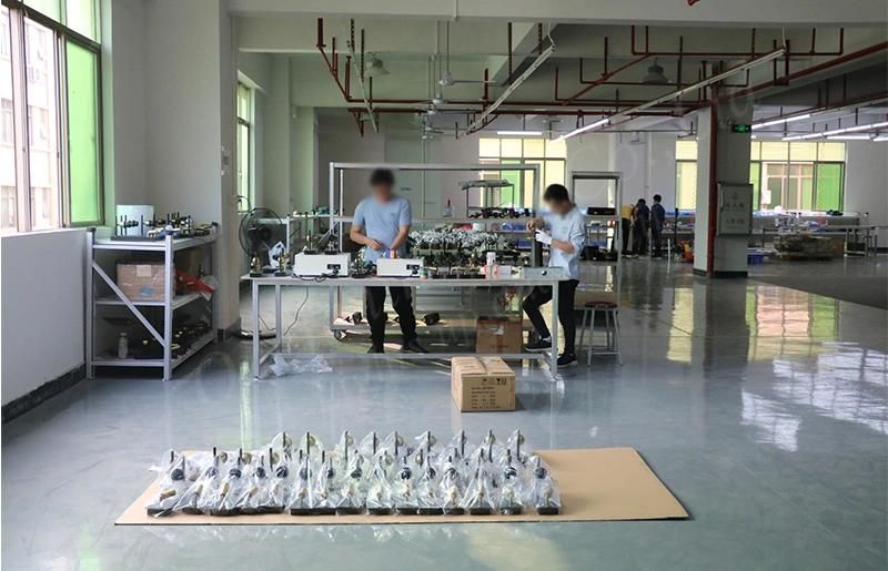 Clear Glass Lamp Shade and Golden Plating Central Rod Wall Lamp.