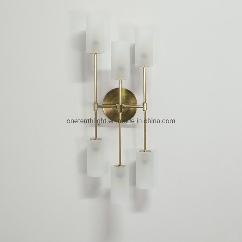 Metal in Brass Finish and Frosted Glass Shade Wall Lamp