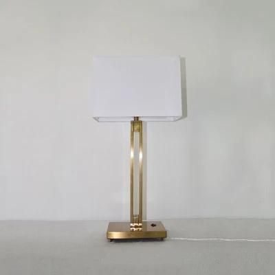 Metal Lamp Body in Brass Finish and White Fabric Lamp Shade Table Lamp.